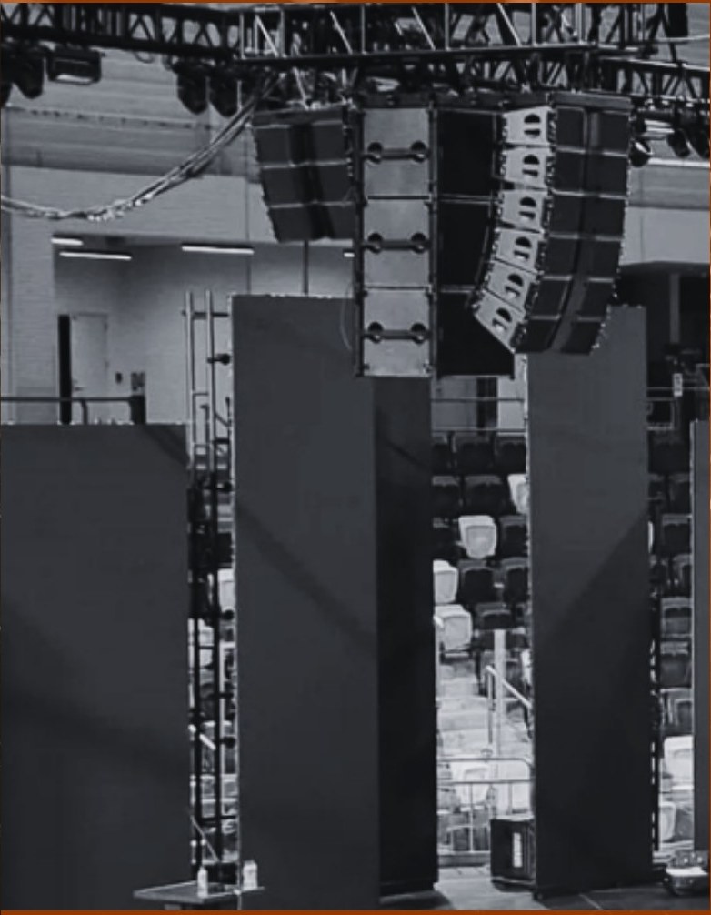 Line array systems on an event stage, from the Polar Audio company profile